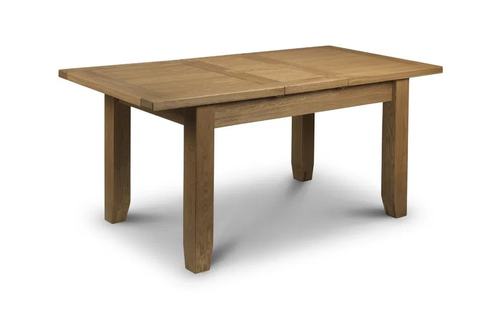 Bring timeless elegance and everyday functionality to your dining room with the Astoria extending dining table with a thick 40mm top in a waxed oak finish. Shop online today at www.nobleandnook.co.uk