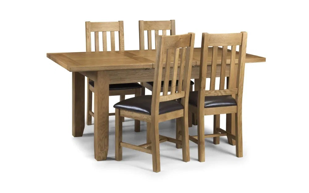 Bring timeless elegance and everyday functionality to your dining room with the Astoria extending dining table with a thick 40mm top in a waxed oak finish. Shop online today at www.nobleandnook.co.uk