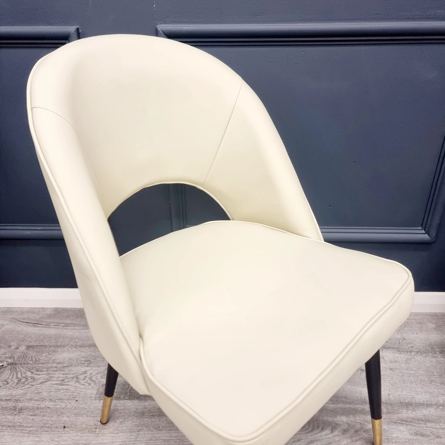 Enhance your dining space with the chic and contemporary Astra Dining Chairs, designed to deliver both comfort and style. Featuring a sleek curved open back and premium vegan upholstery. Shop online today at www.nobleandnook.co.uk
