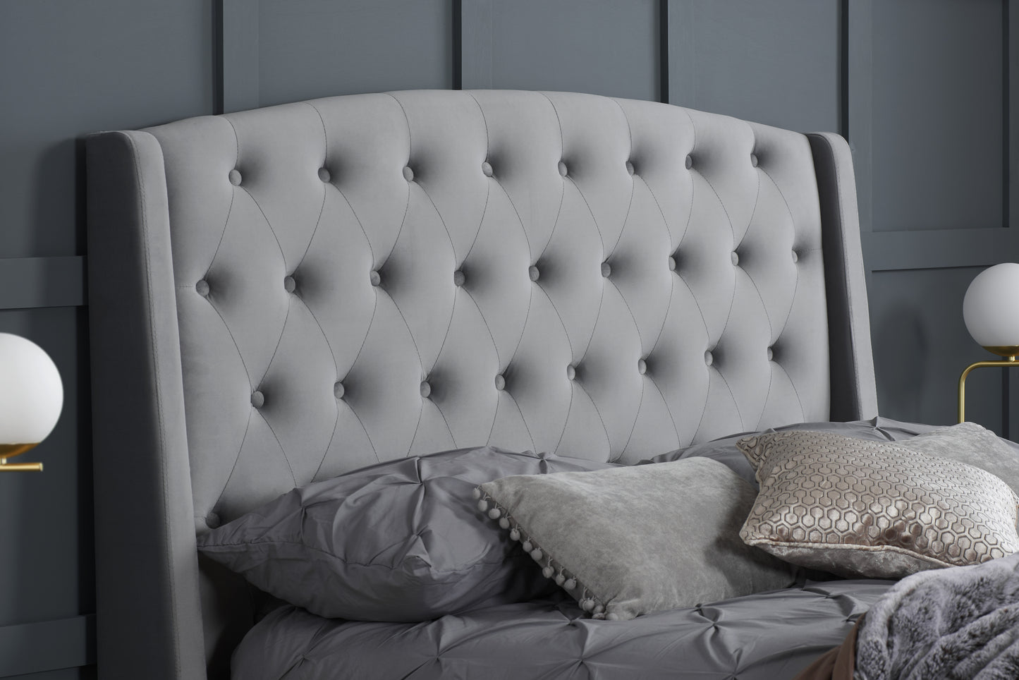 The Balmoral bed frame, a perfect blend of luxury and contemporary elegance. Upholstered in sumptuous grey velvet with striking wingback headboard. Shop online today at www.nobleandnook.co.uk
