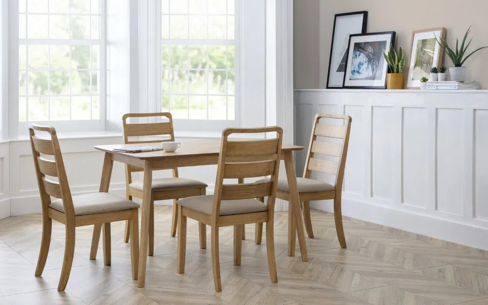 Enhance your dining space with the Norden Oak Veneer Dining Table, a perfect blend of timeless style and modern craftsmanship. Shop online today at www.nobleandnook.co.uk