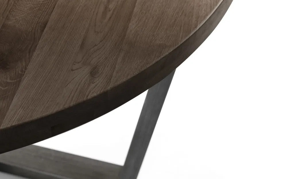 Bring industrial charm and rustic warmth to your dining space with the Brooklyn Round Dining Table finished from solid oak and designed to seat four people. Dimensions: H76xL120xW120cm. Shop online today at www.nobleandnook.co.uk