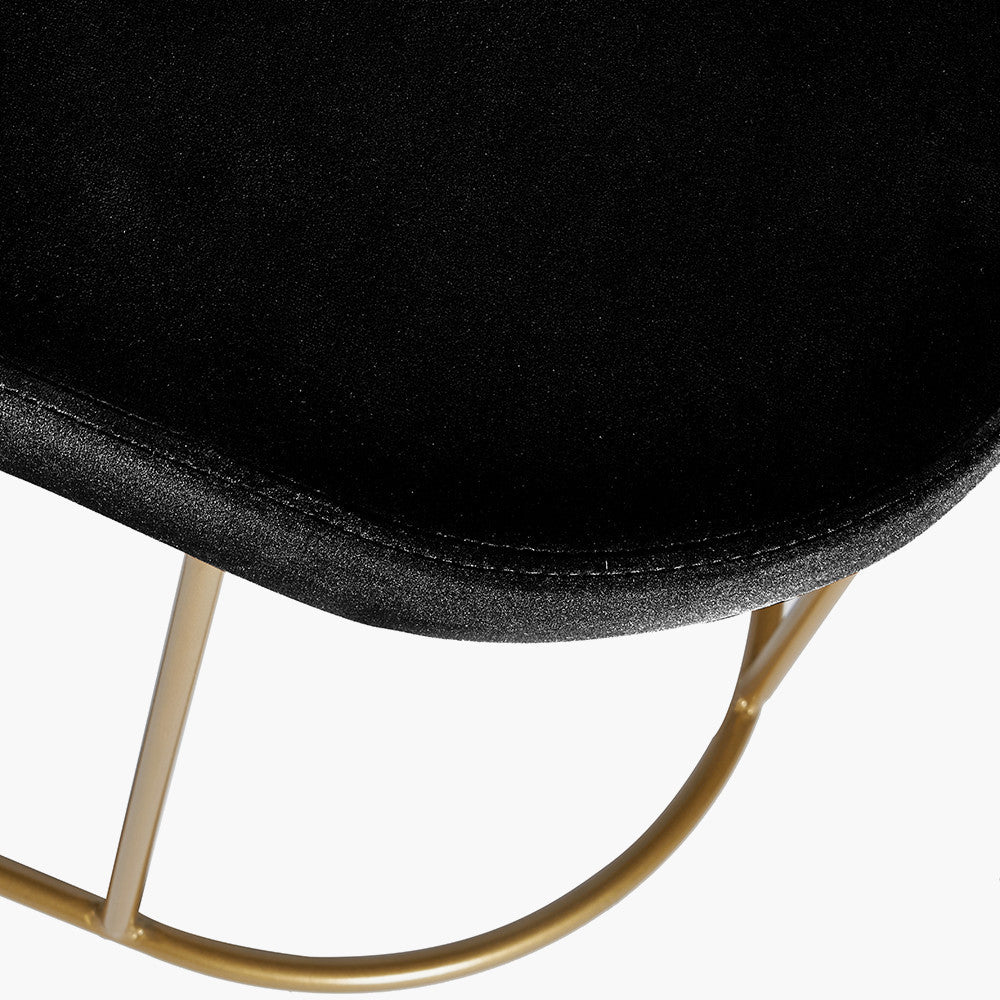 Featuring luxurious Black velvet and a sleek champagne gold metal frame, the this bench is a refined and useful addition to any space. FREE UK MAINLAND DELIVERY on orders over £100. Shop online now at www.nobleandnook.co.uk