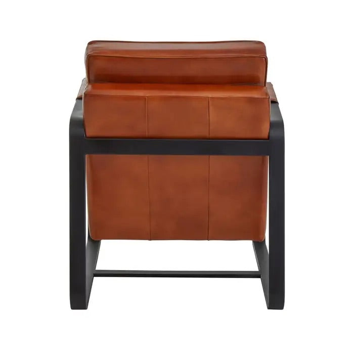 This Buffalo Tan Leather Armchair features genuine tan leather upholstery and a sleek black iron frame, offering both comfort and durability. Free UK Mainland Delivery. Shop online today at www.nobleandnook.co.uk