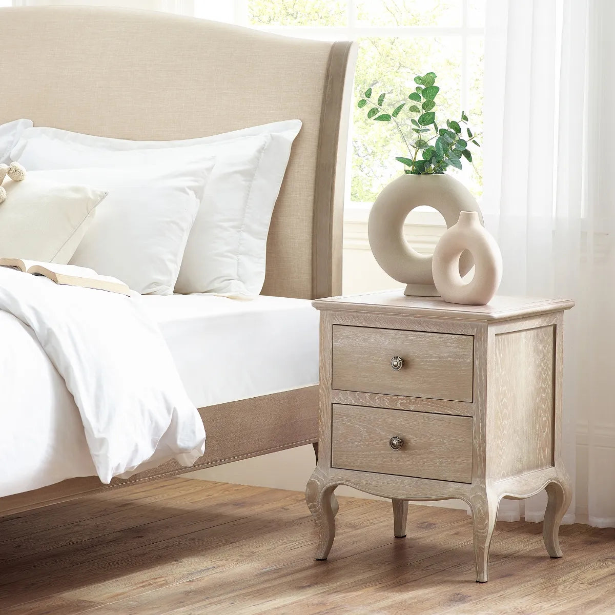 Shop the elegant Camille 2 Drawer Bedside Cabinet constructed in oak with a limed finish. FREE UK Mainland Delivery on orders over £100. Shop online today at www.nobleandnook.co.uk