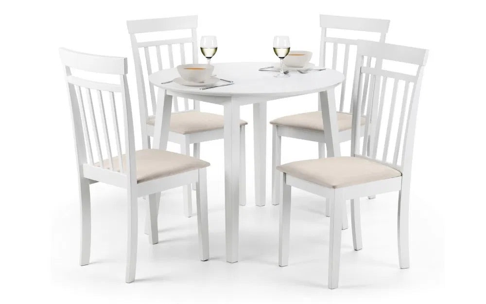 The Coast Drop Leaf 4 Seater Dining Table with two folding leaves allowing you to adapt it for everyday use or entertaining. Finished in a pristine white lacquer. H75 x L55/90 x W90 cm. Available at www.nobleandnook.co.uk
