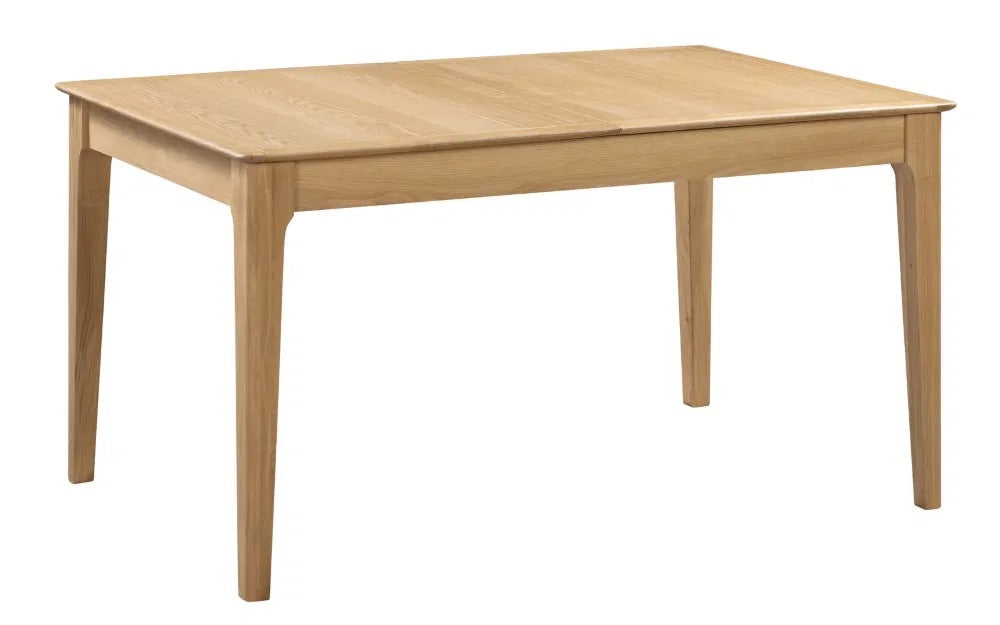 The Cotswold Extending Dining Table, crafted from solid oak and oak veneers, making it a standout piece for both classic and contemporary interiors. Ideal for family dining or entertaining guests