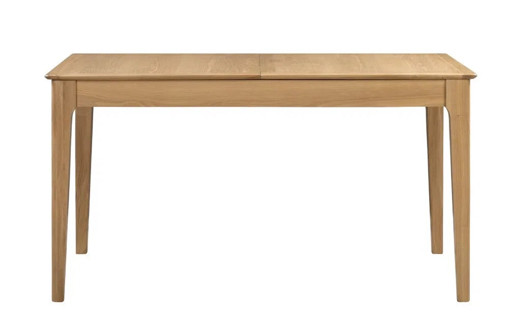The Cotswold Extending Dining Table, crafted from solid oak and oak veneers, making it a standout piece for both classic and contemporary interiors. Ideal for family dining or entertaining guests