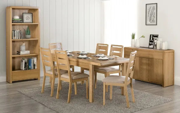 Enhance your dining space with the Elara Dining Chair, expertly crafted from solid oak for a blend of durability and natural beauty. Shop online today at www.nobleandnook.co.uk