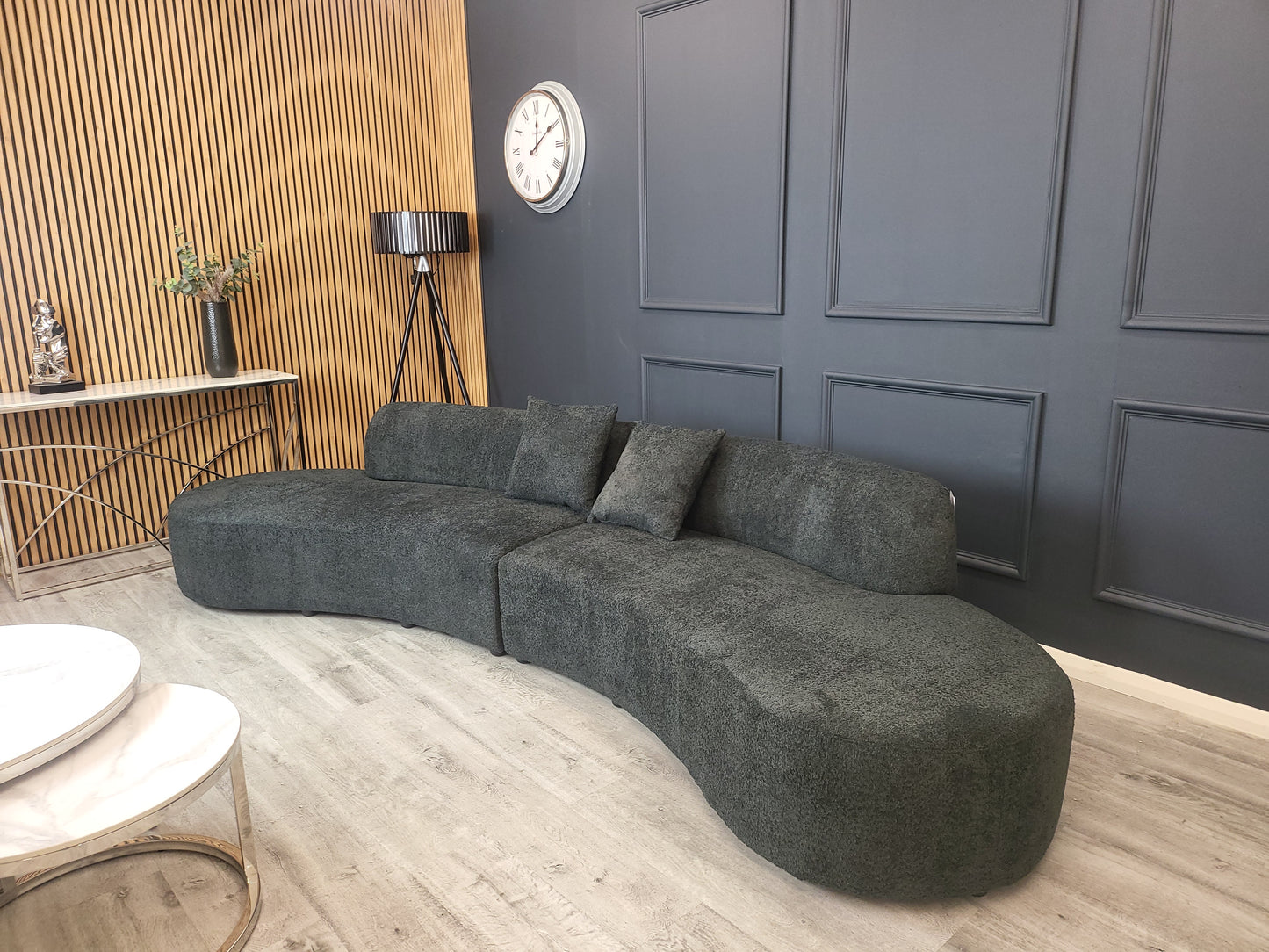 The Miami Curved Cinema Sofa, upholstered in soft and textured bouclé fabric. Perfect for a home games room or home cinema. Shop online today at www.nobleandnook.co.uk