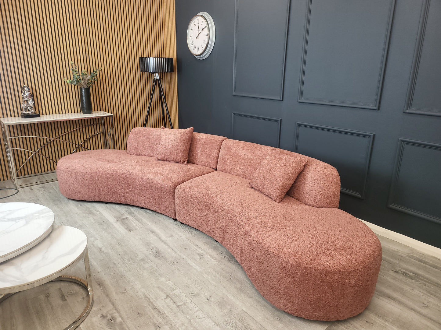 The Miami Curved Cinema Sofa, upholstered in soft and textured bouclé fabric. Perfect for a home games room or home cinema. Shop online today at www.nobleandnook.co.uk
