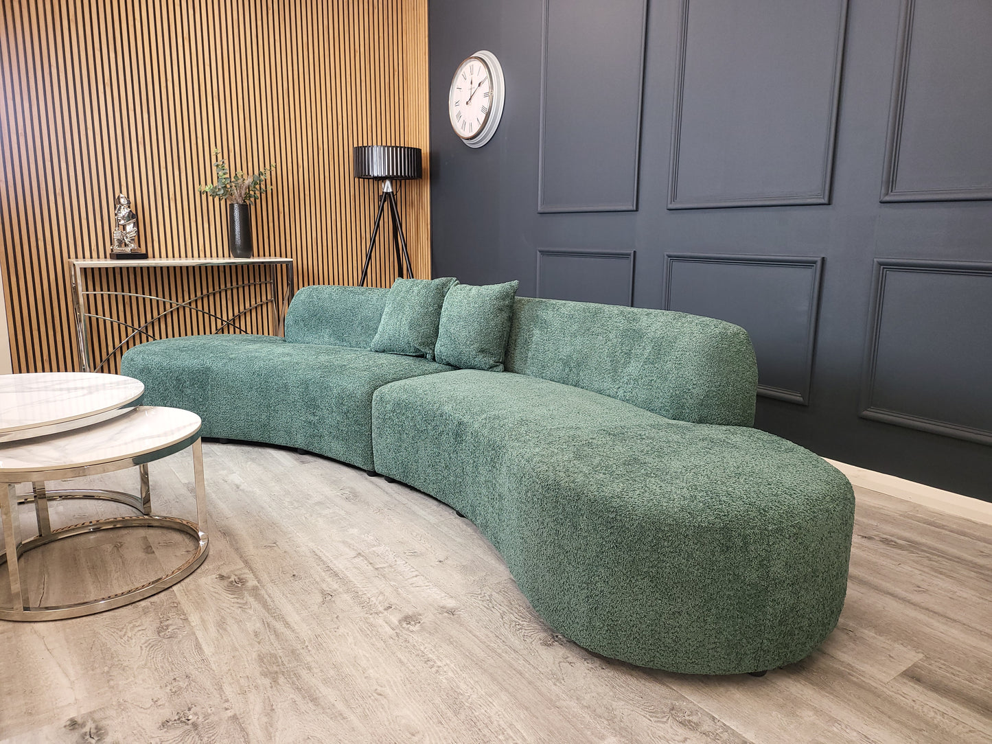 The Miami Curved Cinema Sofa, upholstered in soft and textured bouclé fabric. Perfect for a home games room or home cinema. Shop online today at www.nobleandnook.co.uk