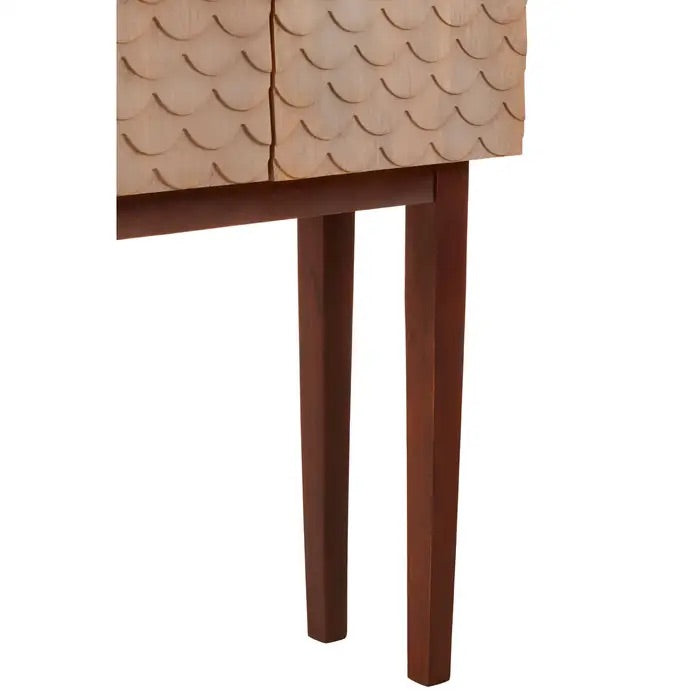Elevate your interior with the Costal 2-Door Cabinet, a blend of style and sustainability crafted from sustainable mango wood. Perfect for contemporary spaces. Shop online today at www.nobleandnook.co.uk
