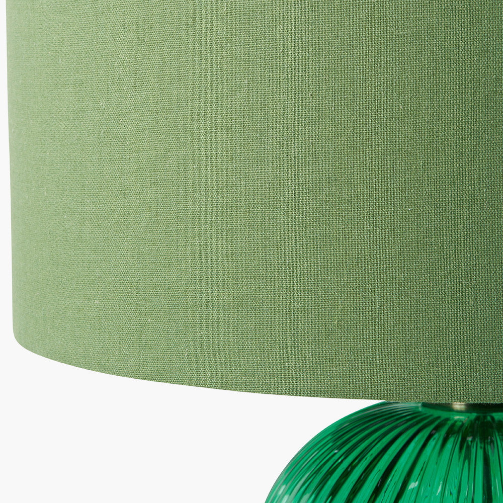 Created in collaboration with the Designers Guild. A blend of premium design and artisanal craft Deep Emerald Ribbed Glass Base with antique brass accents. Ideal for statement lighting in living rooms, bedrooms, or stylish office spaces. Available at www.nobleandnook.co.uk