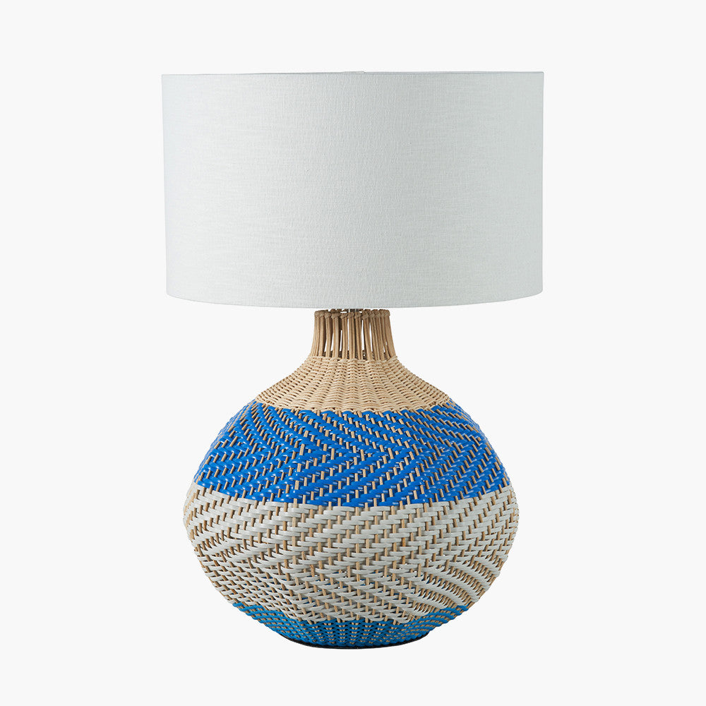 Elevate your home décor with the Brera Large Rattan Table Lamp in Cobalt, a vibrant and textural statement piece crafted in partnership with Designers Guild. Shop online today at www.nobleandnook.co.uk