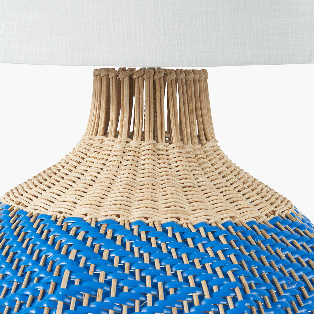 Elevate your home décor with the Brera Large Rattan Table Lamp in Cobalt, a vibrant and textural statement piece crafted in partnership with Designers Guild. Shop online today at www.nobleandnook.co.uk