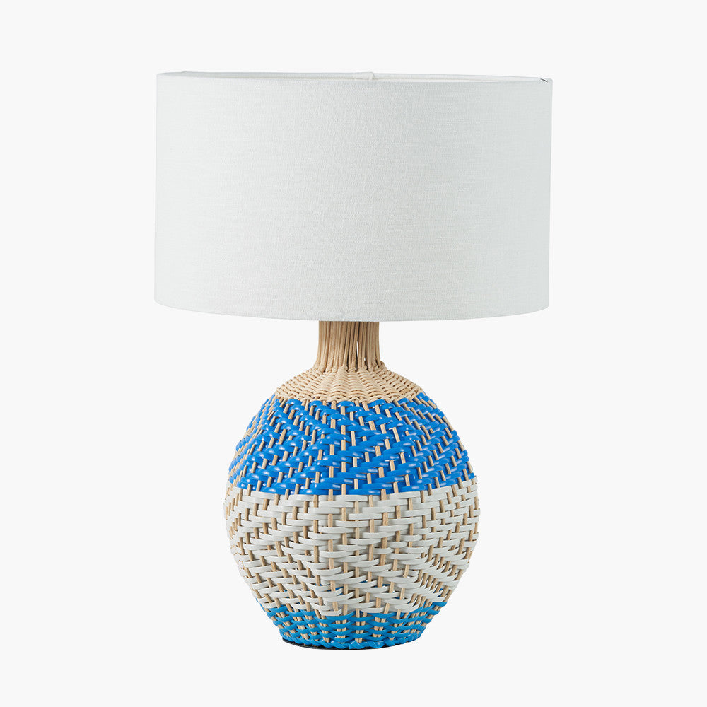 Elevate your home décor with the Brera Small Rattan Table Lamp in Cobalt, a vibrant and textural statement piece crafted in partnership with Designers Guild. Shop online today at www.nobleandnook.co.uk