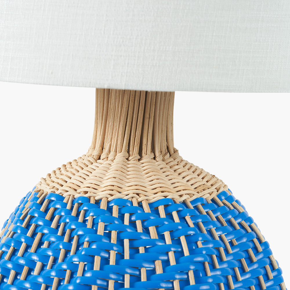 Elevate your home décor with the Brera Small Rattan Table Lamp in Cobalt, a vibrant and textural statement piece crafted in partnership with Designers Guild. Shop online today at www.nobleandnook.co.uk