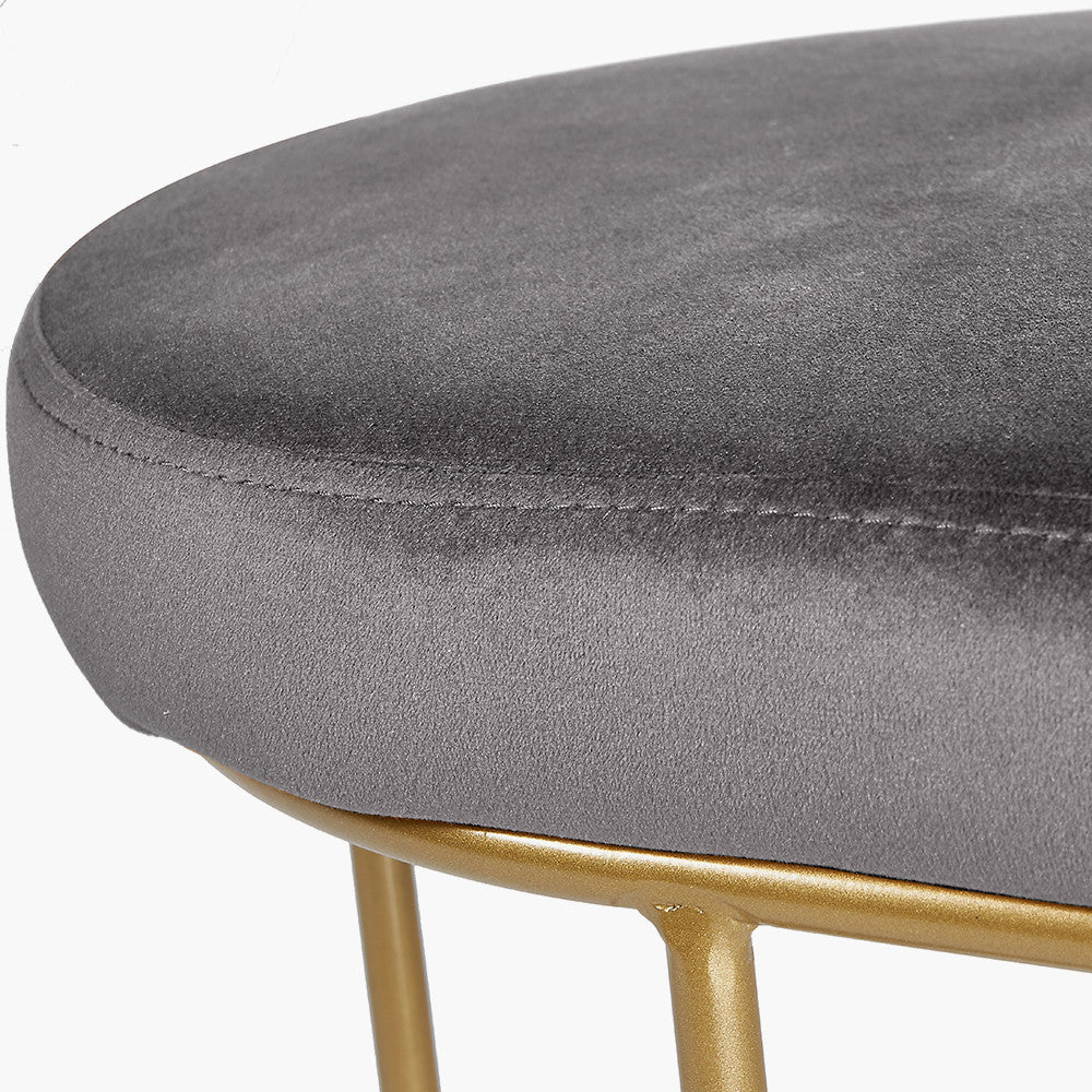 Featuring luxurious dove grey velvet and a sleek champagne gold metal frame, the this bench is a refined and useful addition to any space. FREE UK MAINLAND DELIVERY. Shop online now at www.nobleandnook.co.uk
