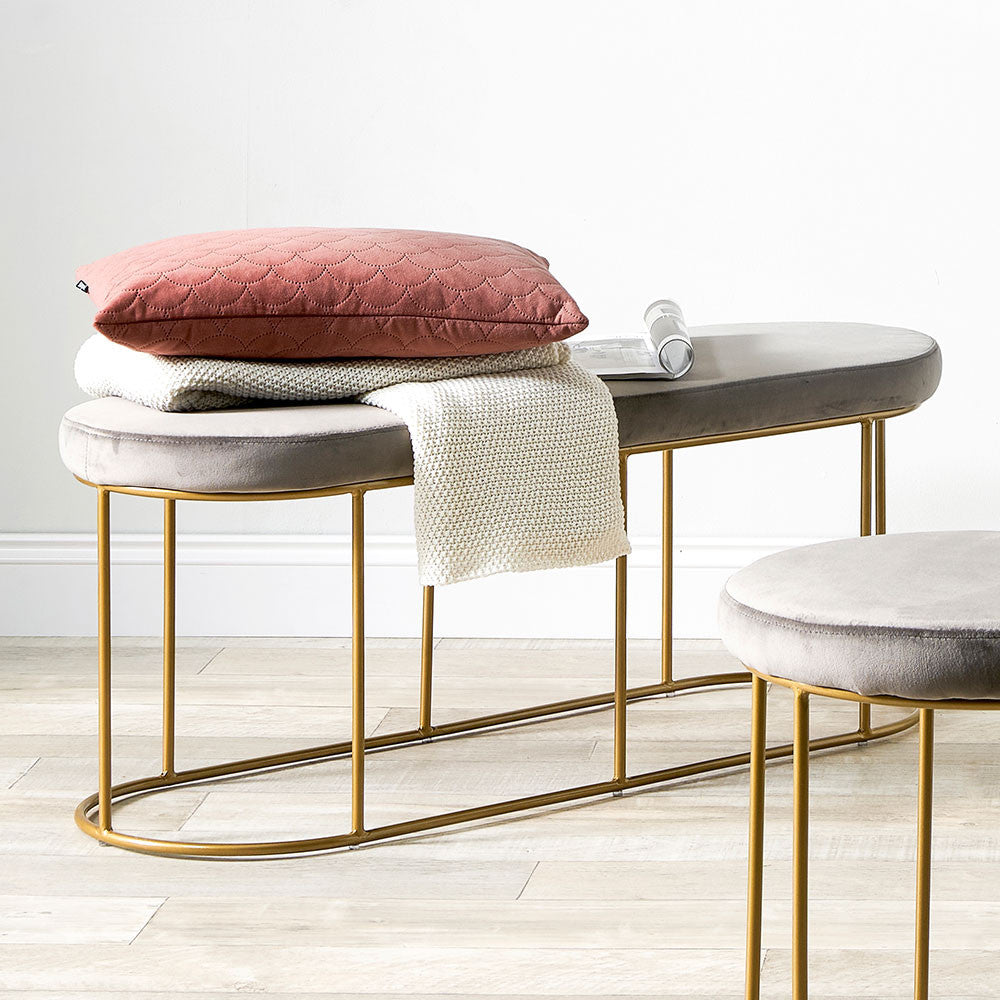 Featuring luxurious dove grey velvet and a sleek champagne gold metal frame, the this bench is a refined and useful addition to any space. FREE UK MAINLAND DELIVERY. Shop online now at www.nobleandnook.co.uk