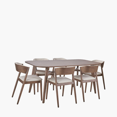 Shop the Elias Dining Table and 6 matching Chairs, blending minimalist elegance with Scandinavian-inspired design. Expertly crafted from solid ash wood with a stylish on-trend dark finish. Shop online today at www.nobleandnook.co.uk