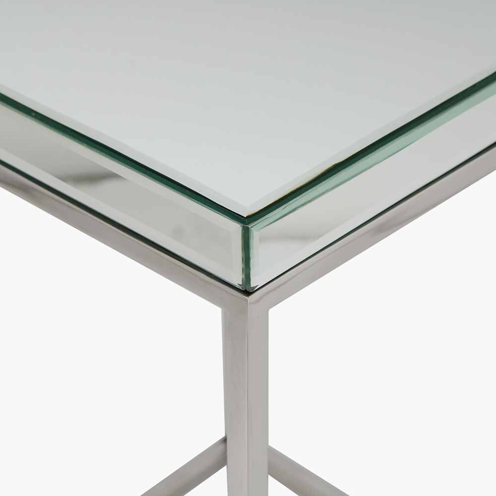 The Elysee Mirrored Glass Console Table, a sophisticated piece that combines modern elegance with practical functionality. Perfect for hallways, living spaces, or bedrooms. Shop online today at www.nobleandnook.co.uk