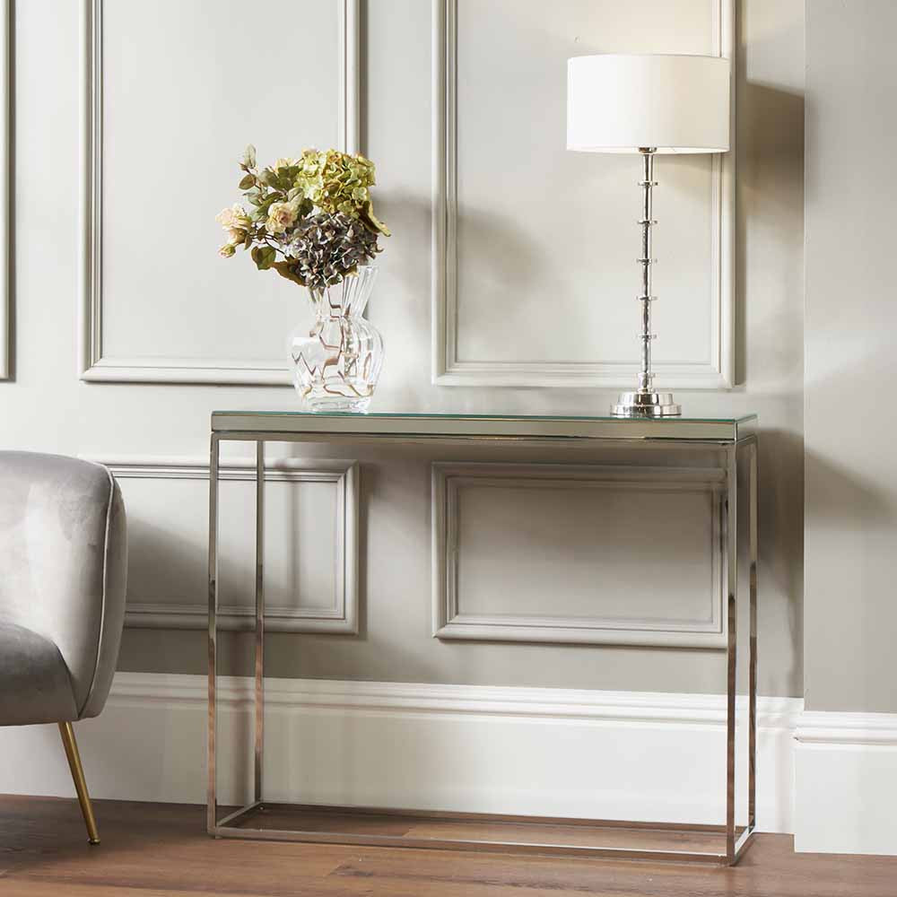 The Elysee Mirrored Glass Console Table, a sophisticated piece that combines modern elegance with practical functionality. Perfect for hallways, living spaces, or bedrooms. Shop online today at www.nobleandnook.co.uk