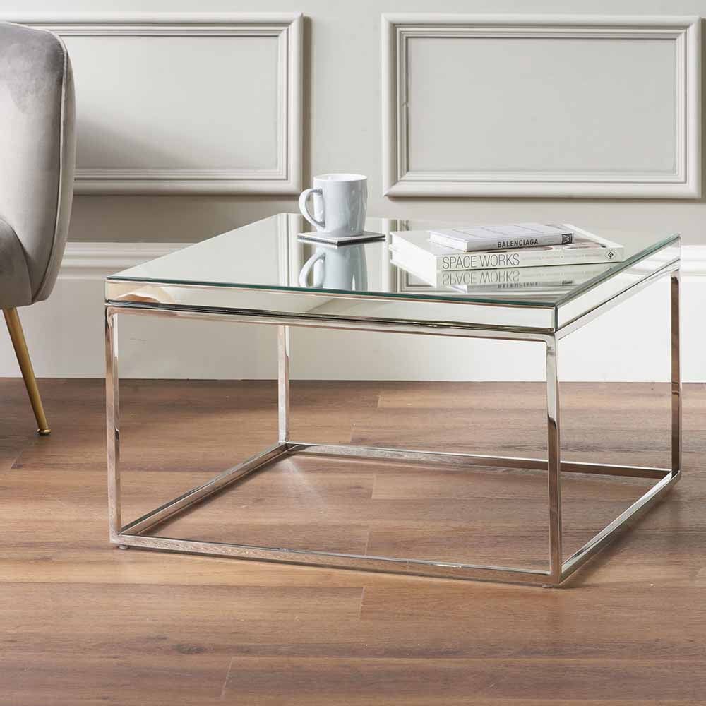 Shop the Elysee Mirrored Glass and Silver Metal Square Coffee Table, a sophisticated addition to any living space. Shop online today at www.nobleandnook.co.uk