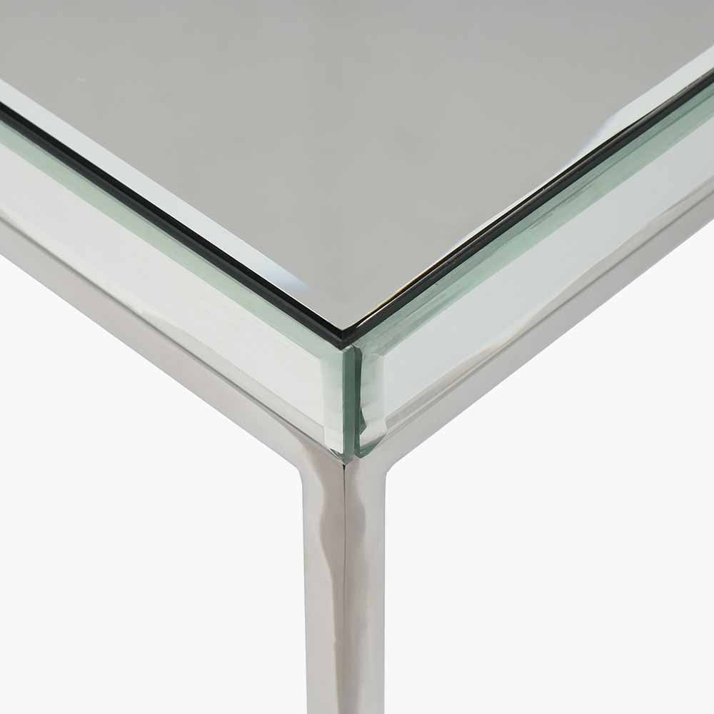 Shop the Elysee Mirrored Glass and Silver Metal Square Coffee Table, a sophisticated addition to any living space. Shop online today at www.nobleandnook.co.uk