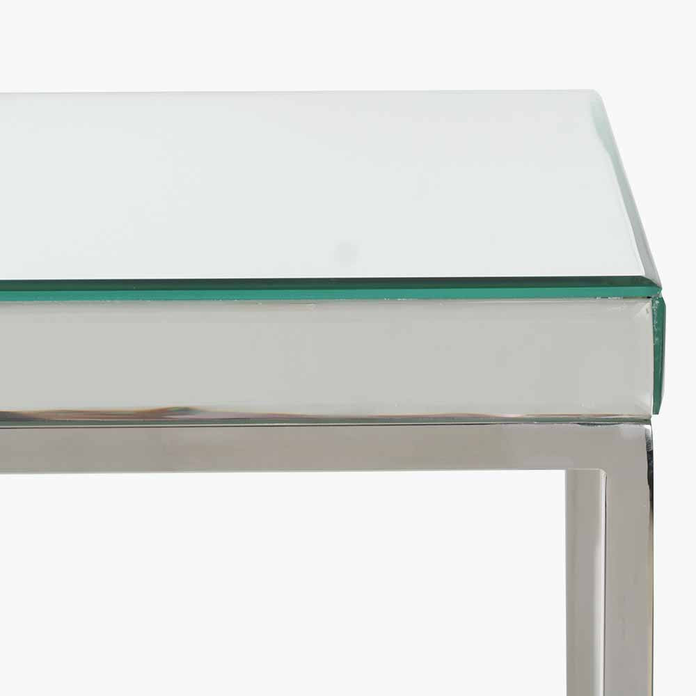 Shop the Elysee Mirrored Glass and Silver Metal Square Coffee Table, a sophisticated addition to any living space. Shop online today at www.nobleandnook.co.uk