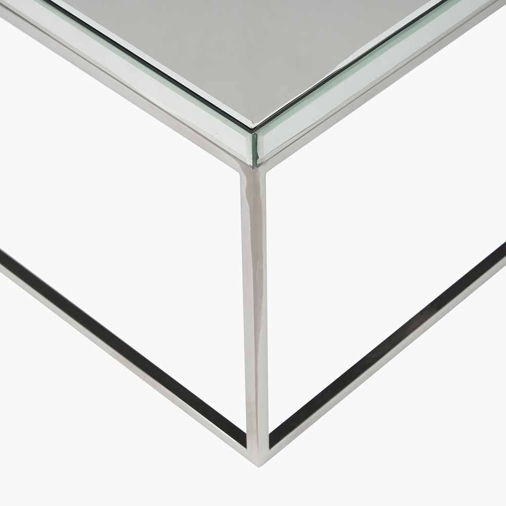 Shop the Elysee Mirrored Glass and Silver Metal Square Coffee Table, a sophisticated addition to any living space. Shop online today at www.nobleandnook.co.uk