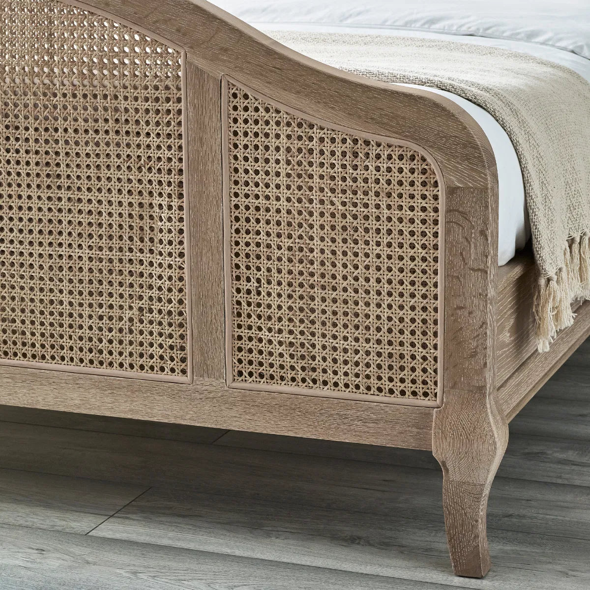 Shop the Château Rattan Bed in Light Oak, featuring an arched headboard and footboard with intricate rattan panelling. Free UK Mainland Delivery. Shop online todat at www.nobleandnook.co.uk