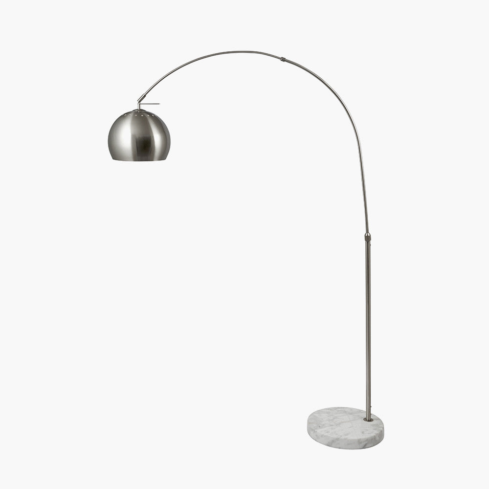This exquisite floor lamp boasts a brushed silver finish and a solid white marble base, exuding sleek sophistication. FREE UK MAINLAND DELIVERY. Shop online now at www.nobleandnook.co.uk