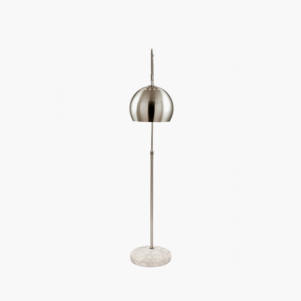 This exquisite floor lamp boasts a brushed silver finish and a solid white marble base, exuding sleek sophistication. FREE UK MAINLAND DELIVERY. Shop online now at www.nobleandnook.co.uk