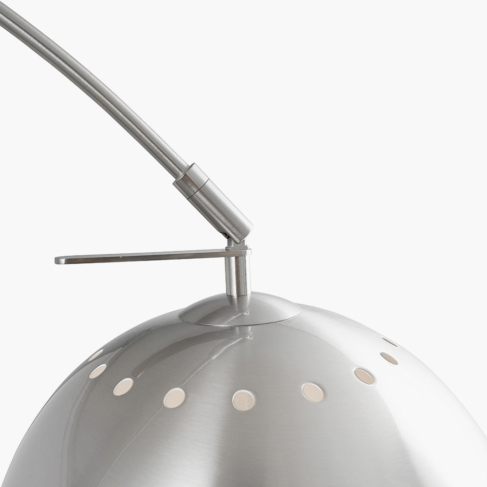 This exquisite floor lamp boasts a brushed silver finish and a solid white marble base, exuding sleek sophistication. FREE UK MAINLAND DELIVERY. Shop online now at www.nobleandnook.co.uk