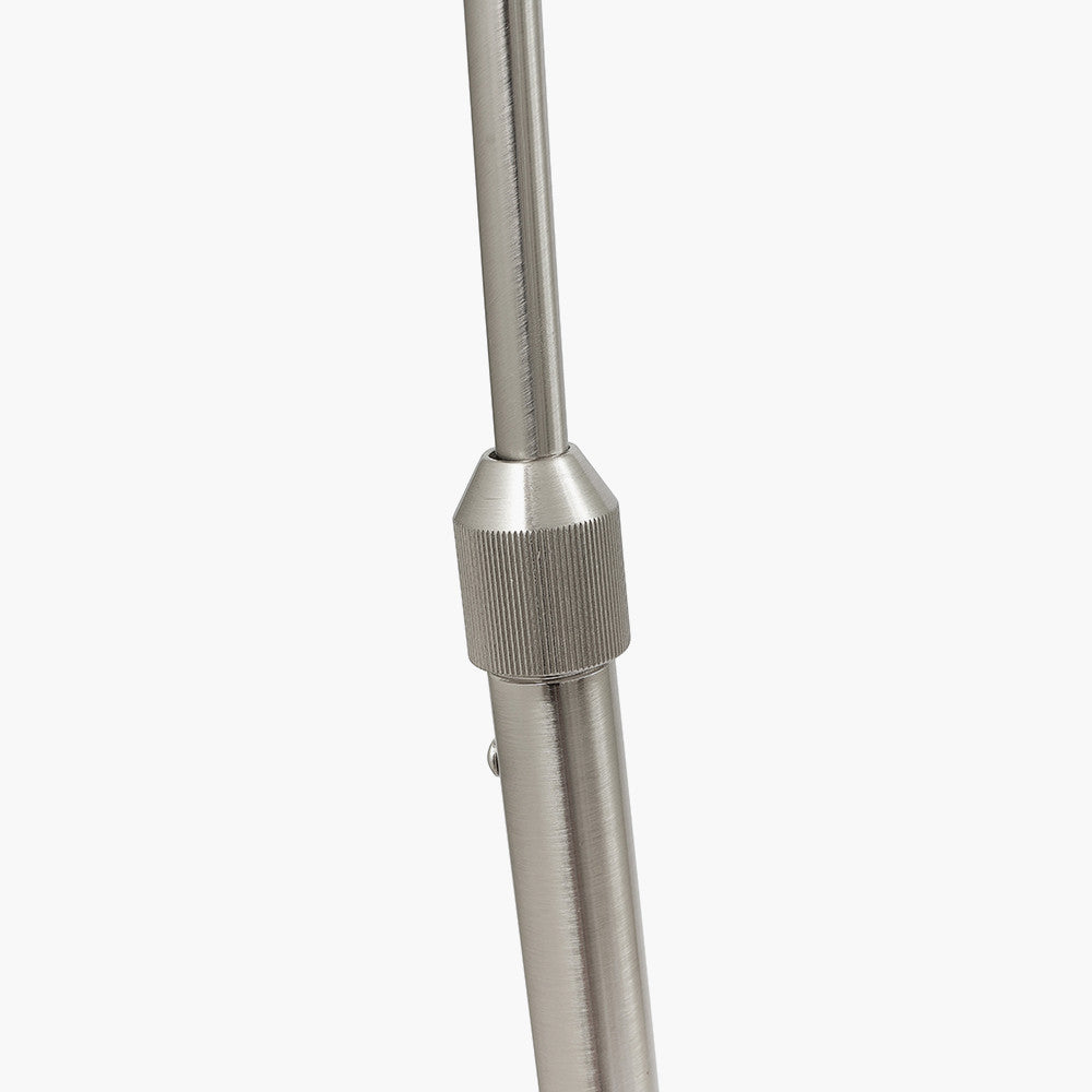 This exquisite floor lamp boasts a brushed silver finish and a solid white marble base, exuding sleek sophistication. FREE UK MAINLAND DELIVERY. Shop online now at www.nobleandnook.co.uk