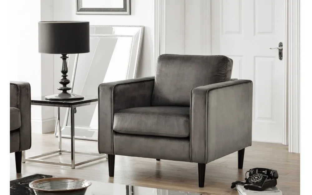 Shop the Hayward Armchair in Grey Velvet, features a deep pile grey velvet that is both elegant and luxurious. A stylish and comfortable addition to any home. Shop online now at www.nobleandnook.co.uk