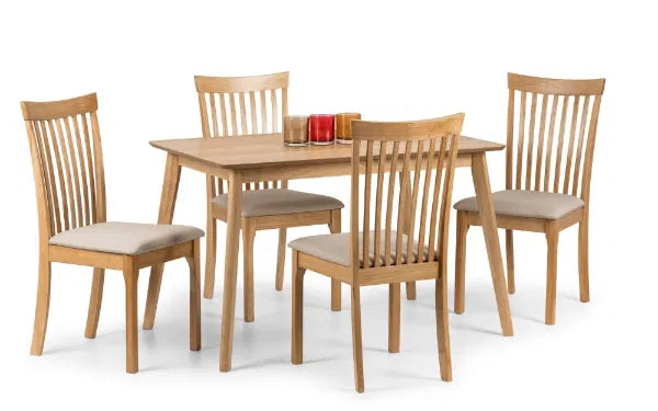 Upgrade your dining space with the Belson Dining Chair, a refined take on the classic shaker design. Expertly crafted from durable hardwood with a light oak finish. Shop online today at www.nobleandnook.co.uk