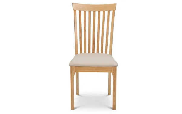 Upgrade your dining space with the Belson Dining Chair, a refined take on the classic shaker design. Expertly crafted from durable hardwood with a light oak finish. Shop online today at www.nobleandnook.co.uk