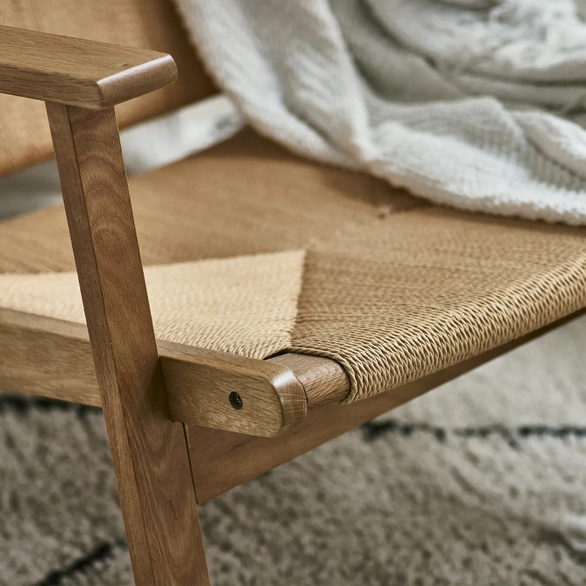 Experience the perfect balance of contemporary design and rustic warmth with the Icaria Chair. Crafted for both style and comfort. Shop online today at www.nobleandnook.co.uk