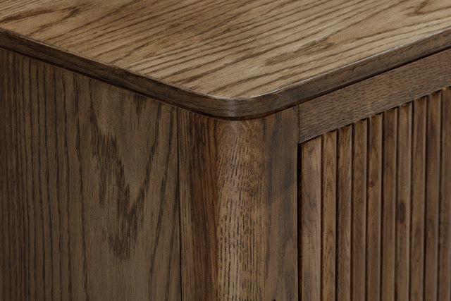 Shop the Abberley Sideboard in Brown stained oak with ribbed design and visible wood grain for a standout look. FREE UK Mainland Delivery. Shop online today at www.nobleandnook.co.uk