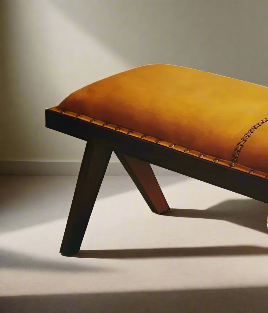 The Inca bench will bring a hint of vintage appeal to home decor with a solid teak frame and elegant angular legs and upholstered in tan leather. Shop online today at www.nobleandnook.co.uk