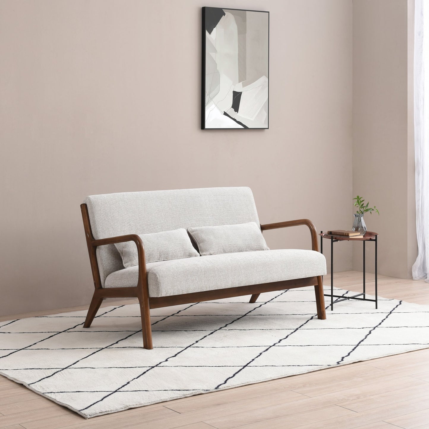 The Inca 2 Seater upholstered in soft Natural Woven Chenille fabric, an elegantly designed sofa featuring a padded back, seat, and bolster cushion, ensuring exceptional comfort. Shop online today at www.nobleandnook.co.uk
