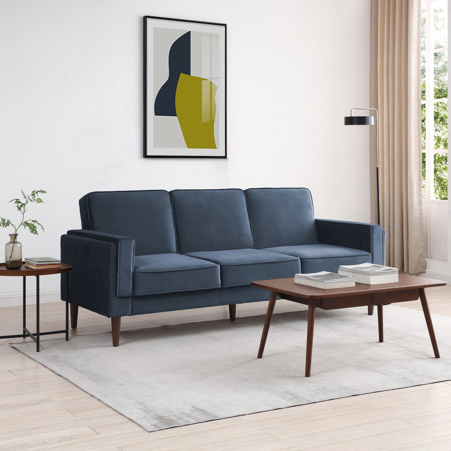Shop the Paolo Sofa Bed in Ink Blue Velvet, a versatile piece that transitions effortlessly from a comfortable sofa to a practical bed, perfect for guests or compact living spaces. Shop online today at www.nobleandnook.co.uk