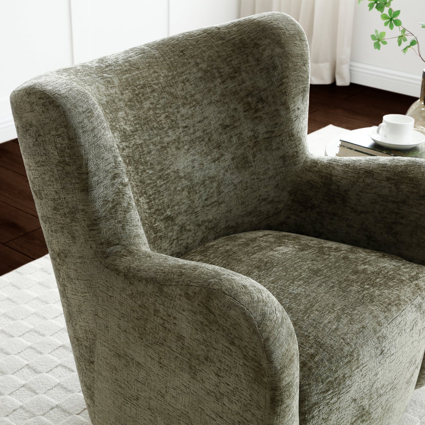 Designed with a modern wingback-inspired form, this eye-catching Teddy swivel chair features smooth, curved arms and a plush seat that offers exceptional comfort. Shop online today at www.nobleandnook.co.uk