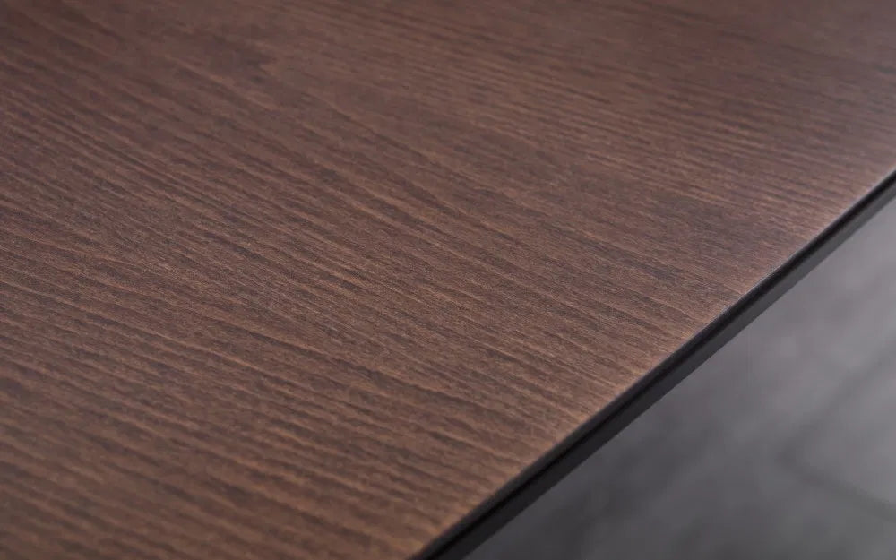 The Kensington Extending Dining Table combines timeless elegance with practical functionality, crafted from solid beech and beech veneers with a rich walnut finish. Shop online today at www.nobleandnook.co.uk