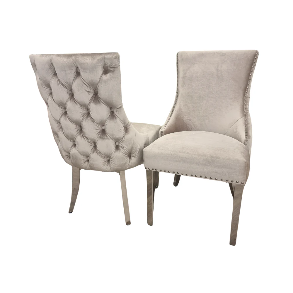 Elevate your dining experience with this exquisite pair of Kensington Velvet Dining Chairs in Beige. Perfect for modern and classic interiors alike. Shop online today at www.nobleandnook.co.uk