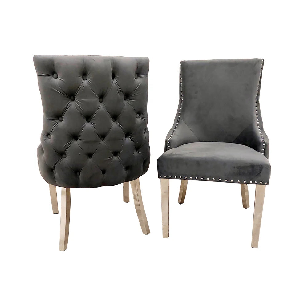 Elevate your dining experience with this exquisite pair of Kensington Velvet Dining Chairs in Dark Grey. Perfect for modern and classic interiors alike. Shop online today at www.nobleandnook.co.uk