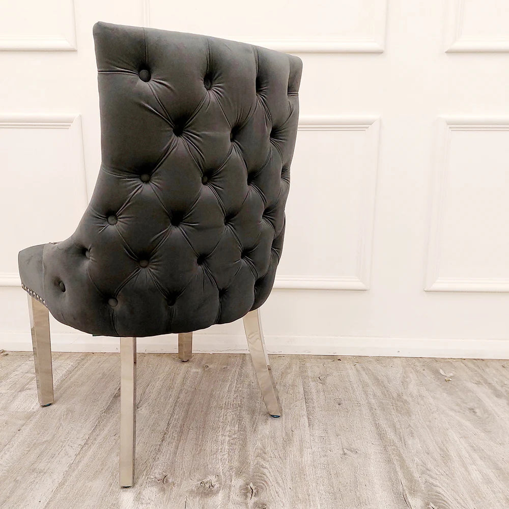 Elevate your dining experience with this exquisite pair of Kensington Velvet Dining Chairs in Dark Grey. Perfect for modern and classic interiors alike. Shop online today at www.nobleandnook.co.uk