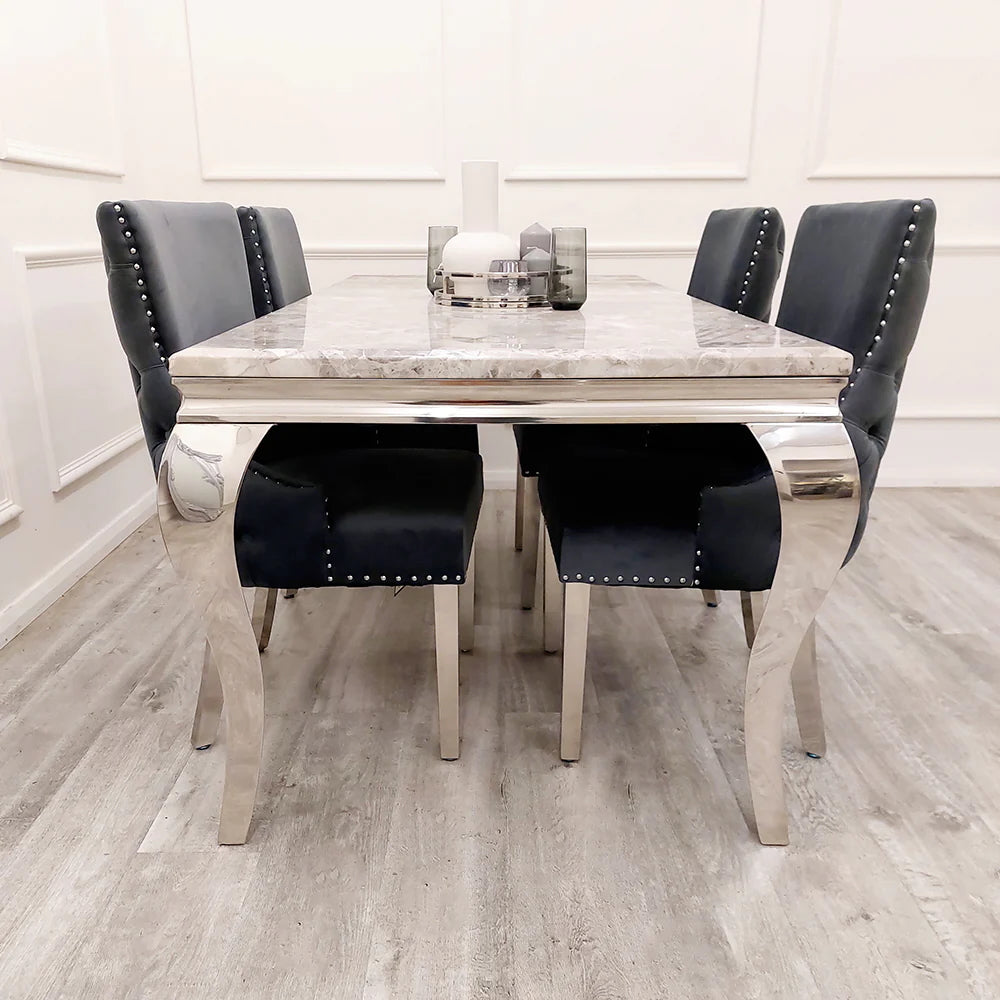 Elevate your dining experience with this exquisite pair of Kensington Velvet Dining Chairs in Dark Grey. Perfect for modern and classic interiors alike. Shop online today at www.nobleandnook.co.uk